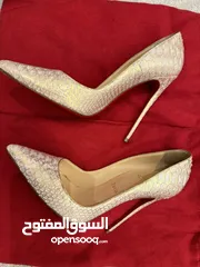  5 Christian Louboutin