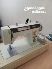 1 ماكينة خياطة سنجر