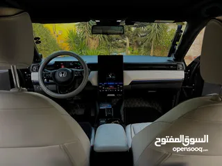 4 Honda E:NS1 E4 electric 2023  هوندا e:ns1 فئة E4 فل اضافات، اسود ميتاليك، داخليه لون ابيض فخمة