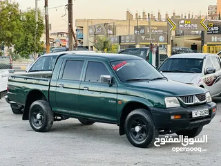  5 ميتسوبيشي L200. (2006)كاش او اقساط من رأسي لاراسك بندون بنك