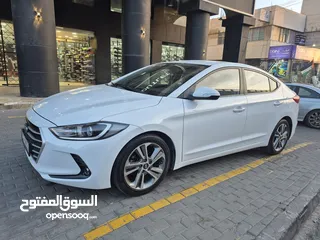  11 هونداي افانتي AD بحالة الوكالة موديل 2018  لون ابيض فحص كامل مالك اول من المنطقه الحرة/ كراسي جلد