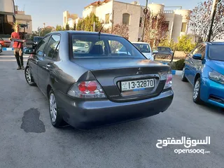  13 ميتسوبيشي لانسر 2008. 1600cc...