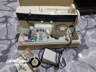  8 ماكنه خياطه سنجر مستعمله + طاولة كوي كبيره الحجم