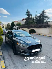  4 Ford fusion Titanium 2014