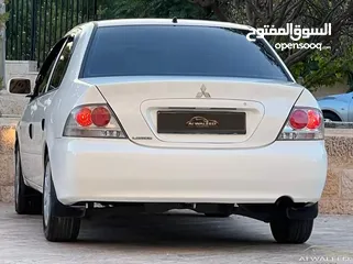  5 ميتسوبيشـــــي لانســــر GLX 2011 وارد الكويت مميزة جدا للبيع بسعر مغري