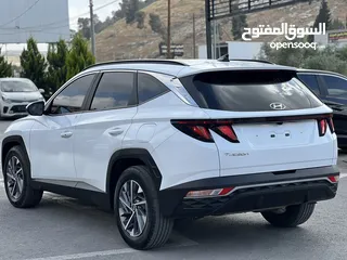  7 هونداي توسان هايبرد ترخيص 2022  بنزين وكهرباء