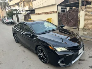  8 Toyota Camry  2018 SEبلس  لون اسود رقم بغداد  محرك اربعه سلندر 2500