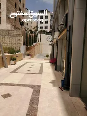  16 للإيجار محل تجاري في شارع وصفي التل (الجاردنز) بعد تقاطع البشيتي في عمارة القدس مساحة 51 متر مربع