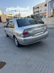  3 ميتسوبيشي لانسر فحص كامل 1600اصلي ولا ملاحظه موديل 2009 اوتوماتيك بوضع الشركه وارد الكويت مالك واحد