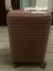  1 Pink cabin size suitcase