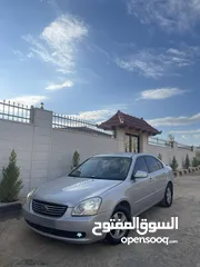  12 كيا لوتزي 2006 3 جيد لون سلفر ماتور 2000cc
