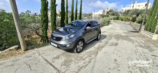  5 جيب كاياسبورتاج موديل 2014-اتومتيك'دفع 4×4 ماتور 2000ديزل فل فل اضافات ماعد الفتحة - نظيف من الاخر