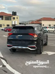  9 كايا سبورتاج /2022 فل بدون فتحة سقف  2x4 ///240Hp بنزين + كهرباء  ( Haybrid) 1600cc
