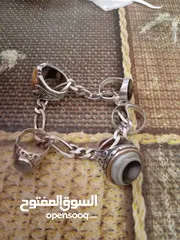  2 خواتم وذبله واسواره كارتير فضة للبيع