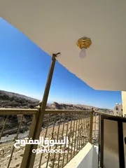  13 شقه طابقيه غير مسكونه للبيع فالكرك منطقه المرج