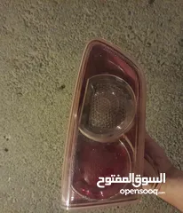  1 طقم  ضواو  ميتسوبيشي   احمر