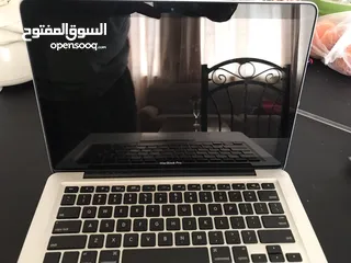 1 Apple Laptop
