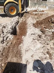  18 حفارة/ جرافة جي سي بي