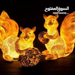  11 تمثال السنجاب  بالحجم الكبير يتوفر التمثال في وضعيتين مميزتين: سنجاب جالس بشكل لطيف