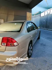 4 هوندا سيفيك 2004...للبيع او .....للبدل ع فورد cmax............