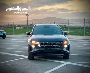  1 هونداي توسان/2022 فل الفل بدون فتحة سقف  2x4 ///240Hp بنزين + كهرباء  ( Haybrid) 1600cc