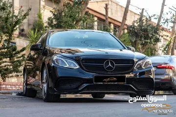 3 Mercedes E200 Avantgarde Amg kit 2015  السيارة وارد و بحالة الوكالة