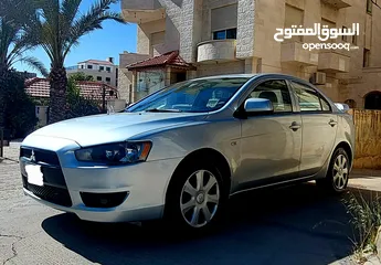  12 ميتسوبيشي لانسر 2014 بحال الوكالة