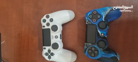  4 playstation 4 slim 500gb with 2 controllers and 7 games