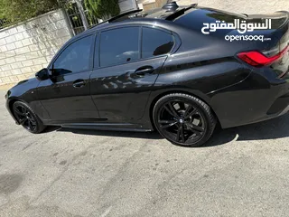 2 BMW 330E black