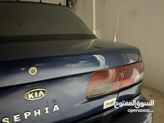  6 كيا سيفيا لون ازرق ميتالك نظيفه مع جنط 15 مميز كاوشوك وكاله غرفه نطيفه بطاريه جديده لسى كفالتها معها