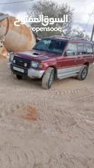  6 ميتسوبيشي باجيو1999  جير اتوماتيك 7 ركاب غرفه جلد عسليه  جير ومطور جاد مركبات