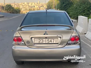  3 ميتسوبيشي لانسر  موديل 2011 GLX ماتور 1600  اصلي وارد الكويت بختم الوكيل الملا الاصلي. فحص كامل