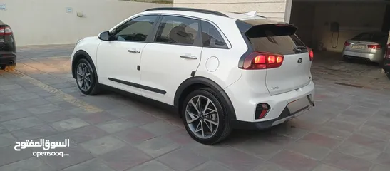  14 كيا نيرو 2021 جمرك جديد وارد كوري ممشي 32  الف فحص كامل جنطات تورنج