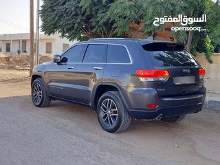  6 جيب جراند شيروكي فل الفل اعلى فئة بانوراما 2014 فحص كامل لون فيراني مميز بسعر مغري قابل للبدل والاقص