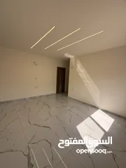  23 شقه طابق ارضي 144متر مع ترس 30 متر للبيع في جبيهه حي المنصور بموقع مميز