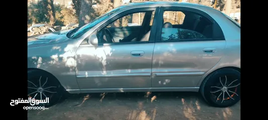  1 سيارة دايو لانوس موضيل 2002 موتور 1600 السيارة لعبة بالنايلون منفولة جديد مش ناقصها غير الصلاة ع نبي