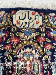  27 سجادة ايراني ممضية (كرمان راور)