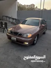  1 دايو لانوس موديل 1997 جير عادي ماتور 1500 سنتر اصلي جنط الاصلي فحص مرفق