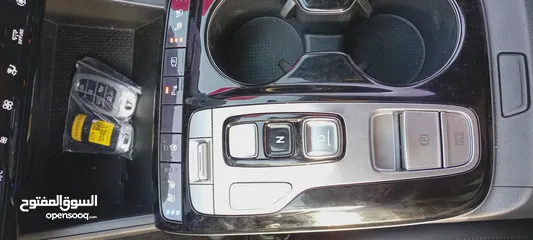  16 Hyundai Tucson hybrid 2021  هيونداي توسان هايبرد 2021  . وارد كوريا الجنوبية  . فحص 7 جيد -