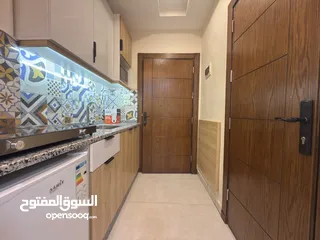  10 26 استديو للبيع عند الجامعة الاردنية تشطيب جديد حمام و مطبخ لكل استديو عائد استثماري مميز جدا و مميز
