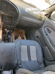  15 كيا سبيكترا 2001 بسعر 2400 جير عادي سياره نظيفه جدا  kia spectra 2001
