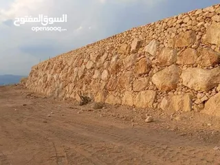  18 استصلاح اراضي زراعيه بناء سناسل حجريه سلاسل حجريه تشييك اراضي تشييك مزارع تنسيق حدائق وبناء