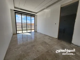  14 شقة أرضية مميزة في عبدون للبيع بموقع حيوي   الرقم المرجعي : 14199