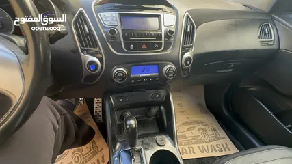  17 2009 ‏Hyundai توسان LX20 اربع ابواب، اللون فيراني، الكراسي جلد والسيارة 92,000 كيلو فقط وبحالة رائعة
