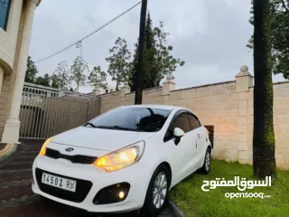  1 كيا برايد 2015 بحالة الوكالة فل اوتماتك ترخيص وتإمين جديد الله يبارك ..