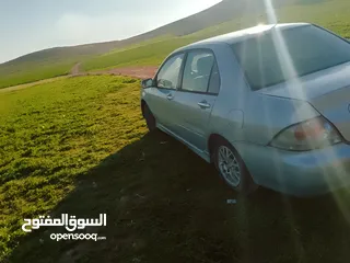  1 ميتسوبيشي لانسر 2005 محرك 1600 اصلي وارد الكويت