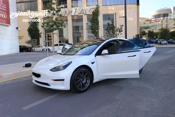  3 تيسلا 3 موديل 2021 لون ابيض لؤلؤي
