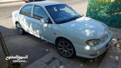  1 كيا تو 99 بحالة ممتازة وبسعر جيد
