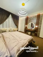  19 For sale in Ajman, in Horizon Towers Ajman, the most elegant and elegant, two rooms and a hall, over