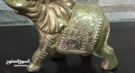  4 فيل نحاس منقوش